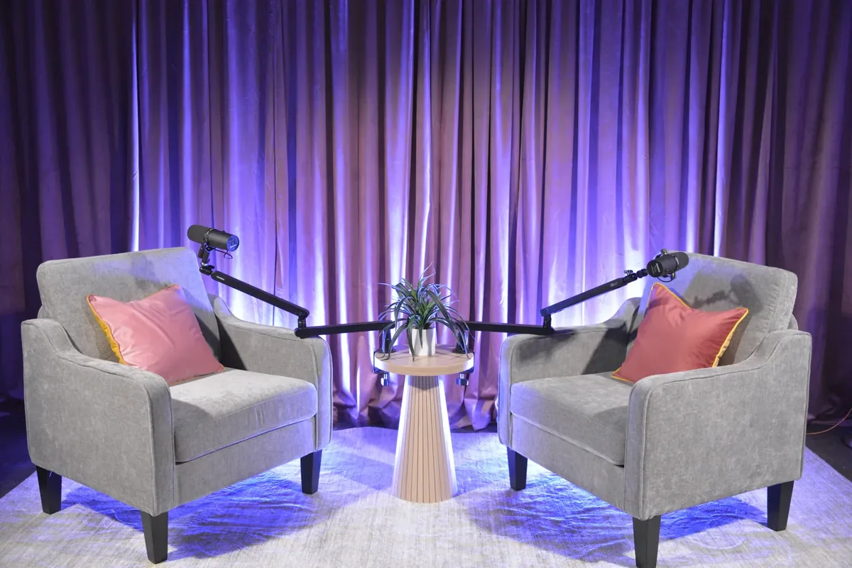 Video podcast studio with purple lighting in Brooklyn